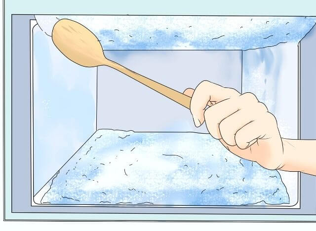 Scraping the frost in the fridge