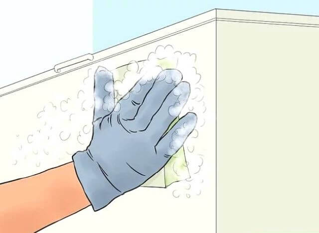 the correct way to clean a chest freezer